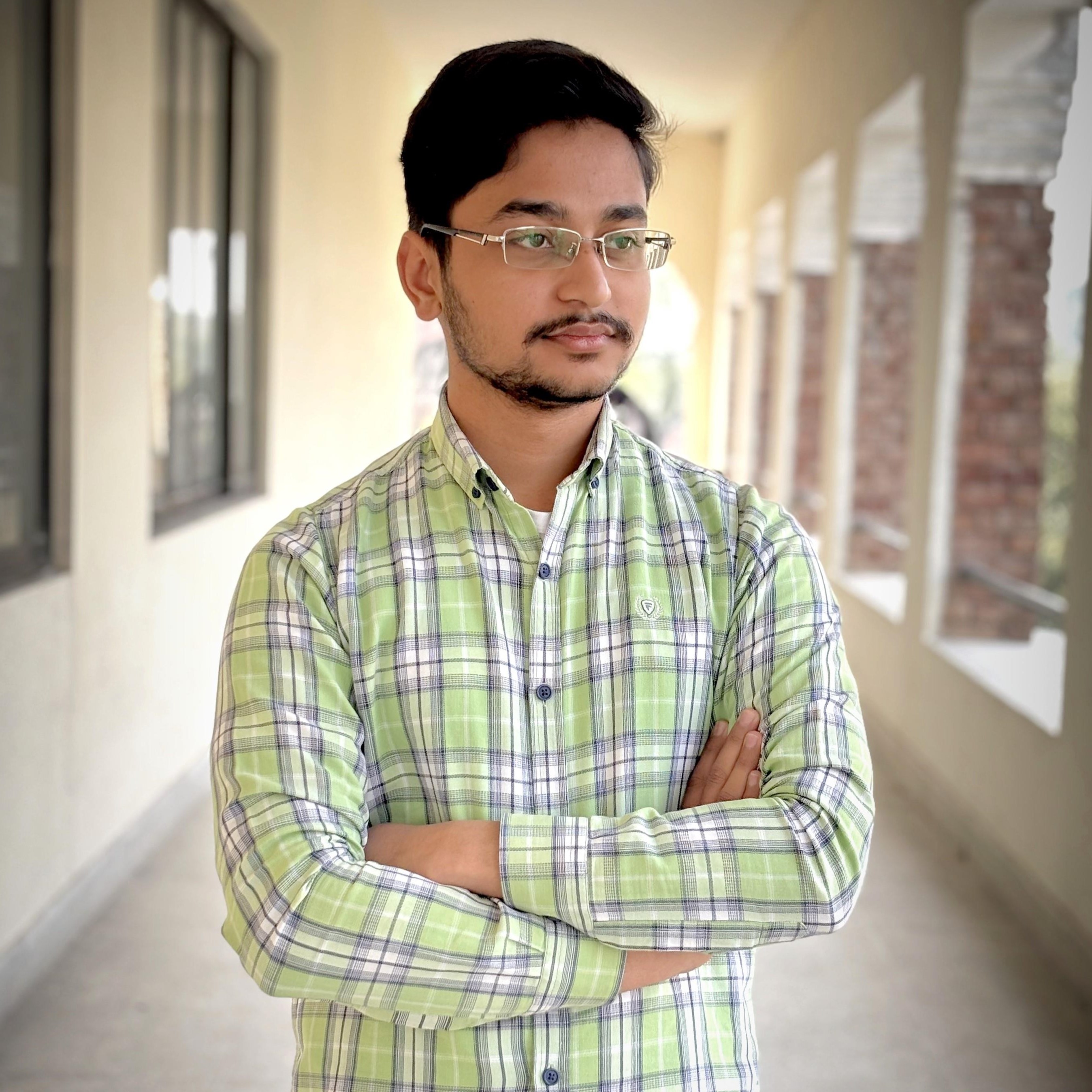 Profile picture of a person with glasses and a beard