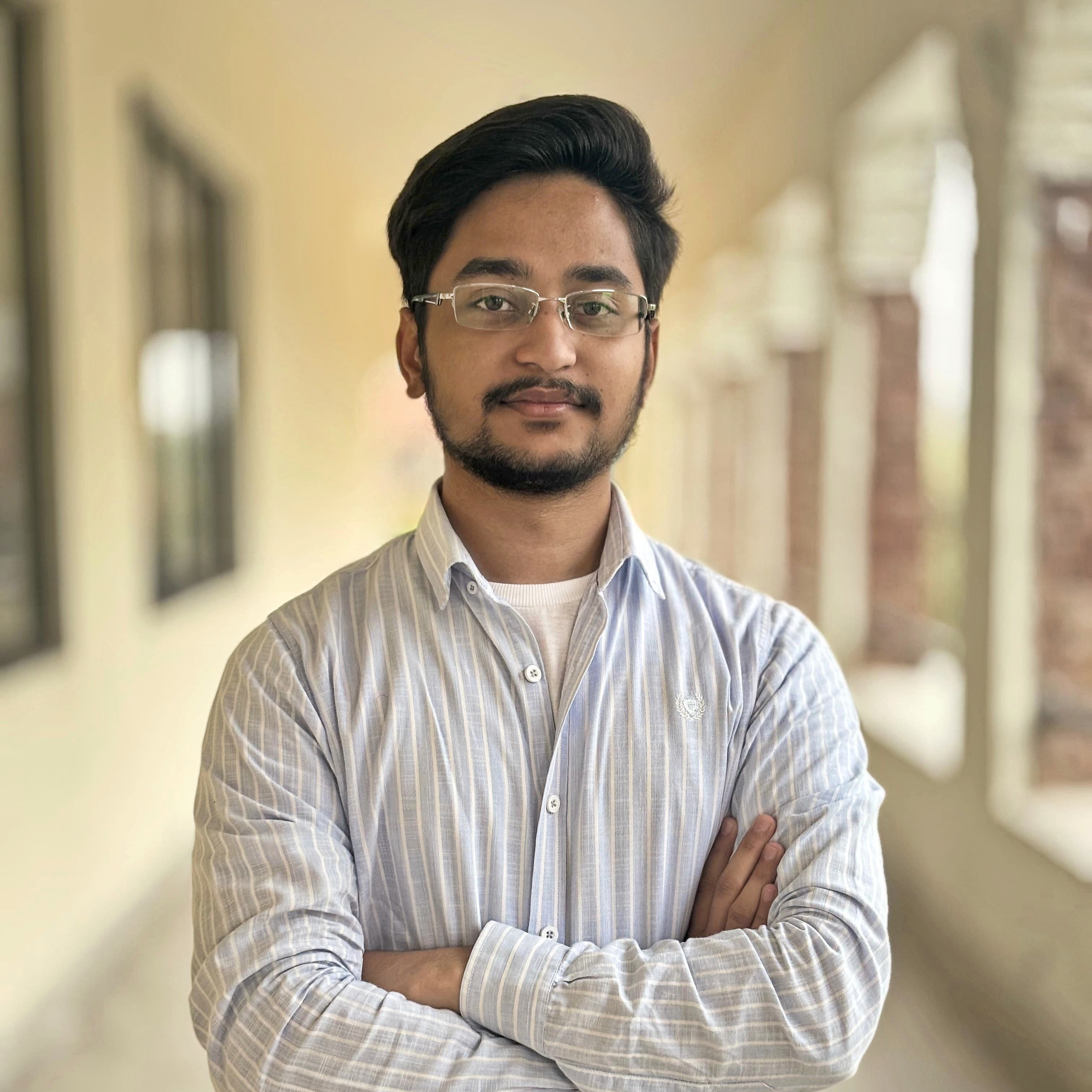 Profile picture of a person with glasses and a beard